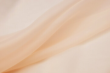 Fototapeta na wymiar Silk fabric, organza is light beige.