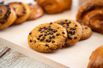 tasty chocolate cookies on gray table