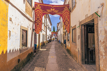 Óbidos - June 29, 2021: Street view of the medieval town of Óbidos, Portugal