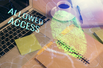 Double exposure of fingerprint drawing and desktop with coffee and items on table background. Concept of security.
