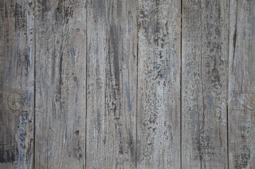 heavily old cracked wood planks.
structure of dark wood for background.