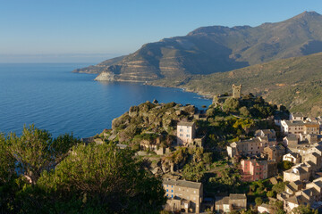 Fototapeta na wymiar View of the village of Nonza with its Genoese tower, Cap Corse in Corsica, France