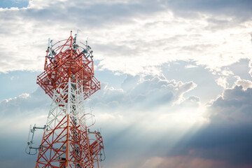 communication tower top. Radio antenna Tower , microwave antenna tower on light sky background....