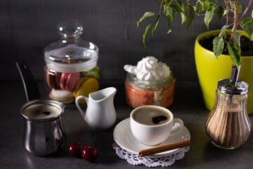 Cup of coffee on  table background. Set of coffee and sweets food ingredient