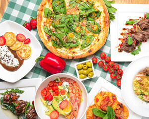 Italian cuisine concept top view Italian dishes. Summer strawberry menu.