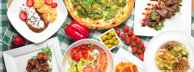 Italian cuisine concept top view Italian dishes. Summer strawberry menu.