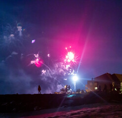 Fireworks over the jetty on a summer night in Manasquan, New Jersey.