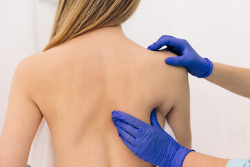 Modern rehabilitation physiotherapy worker with woman client. Physiotherapy improves the patient's...