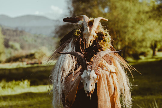 Shaman invoking the spirits in a ceremony in a forest