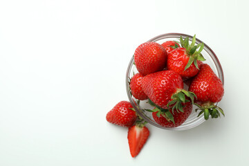 Bowl of fresh strawberry on white background