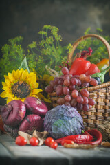 The table, decorated with vegetables, pumpkins and fruits. Harvest Festival,Happy Thanksgiving. Autumn background. Selective focus. Vertical.