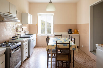 Interior of a large Italian country kitchen. nobody inside