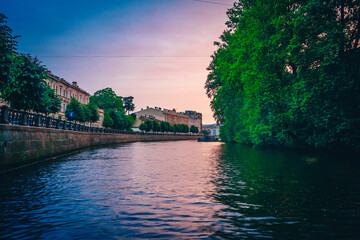 The embankment of St. Petersburg during a bright sunset.