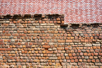 Fragment of a historic, medieval brick wall in Poznan
