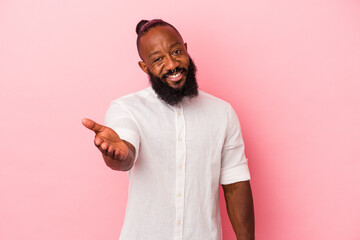 stretching hand at camera in greeting gesture. © Asier