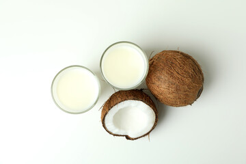 Concept of coconut milk on white background