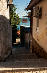 The street of the seaside town. The inscription on the sign – "Apartments for rent". Gurzuf, Yalta, Crimea.