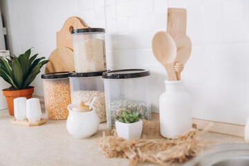Fototapeta na wymiar Modern kitchen with zero waste food and dishes cleaning items. Sustainable lifestyle concept.