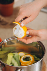 Woman cutting fruits and vegetables