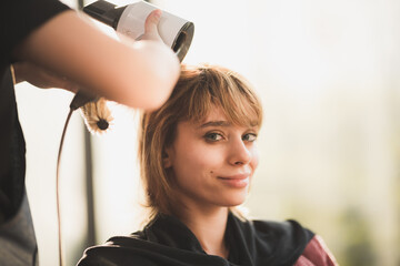professional hairdresser stylist person and hair fashion beauty salon concept, woman client about...