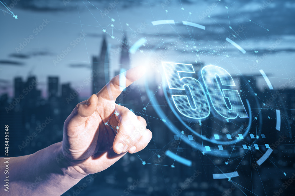 Poster hand pointing at abstract 5g interface on blurry night city background. internet speed concept. doub