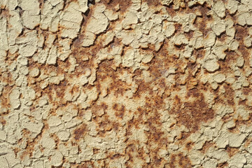 Texture of old metal surface, peeling paint, rust showing through paint