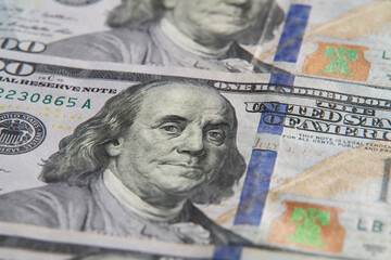 Obraz na płótnie Canvas A closeup of a new design of a hundred dollar bill
