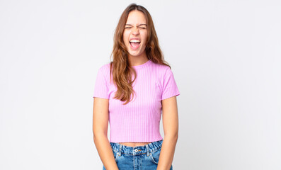 young pretty woman shouting aggressively, looking very angry