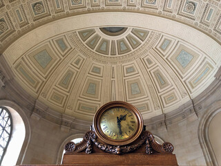 Oppulent stucco ceiling architecture with domes, archways, columns and frescos inside old historic...