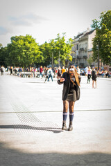 Beautiful country girl in 90s style. Back in time 90s 80s. Stylish girl in retro colourful vintage...