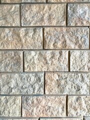 Brick wall with gray bricks, background from gray textured bricks.