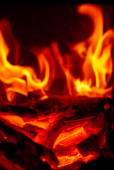 Red tongues of flame on a black background.