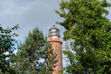Fototapeta na wymiar Der Leuchtturm Darßer Ort in den Dünen des Weststrandes von Prerow auf dem Darß