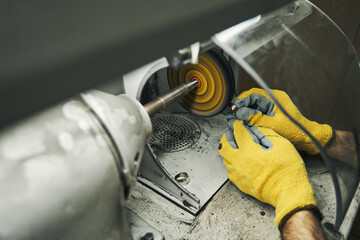 Male grinding ring on an abrasive wheel grinder