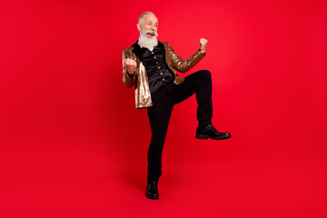 Full body photo of hooray grey beard elder showman hands fists wear gold jacket pants isolated on...