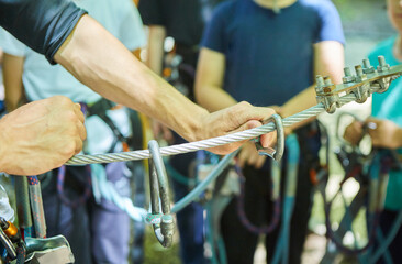 Ropes and carabiners for mountaineering or climbing on ropes. Equipment for active sports.