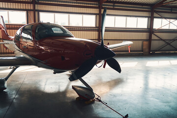 Airport parking building with modern light aircraft