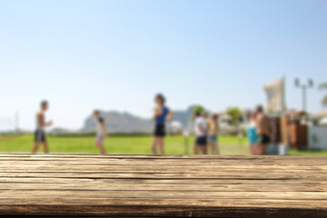 Wooden desk of free space and summer background 