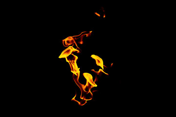 Fototapeta na wymiar Real flames from underground gas isolated on black