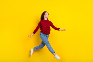 Fototapeta na wymiar Full body profile side photo of young attractive woman happy positive smile jump go walk isolated over yellow color background