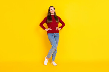 Fototapeta na wymiar Full length photo of young attractive woman happy positive smile confident look empty space isolated over yellow color background