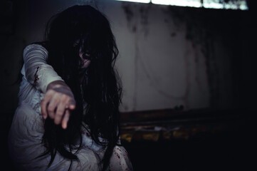 Portrait of asian woman make up ghost,Scary horror scene for background,Halloween festival...
