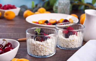 cottage cheese with berries and fruits apricot for healthy breakfast.