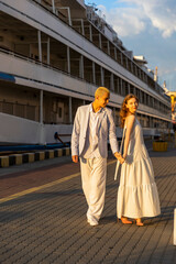 young couple walking in the seaport