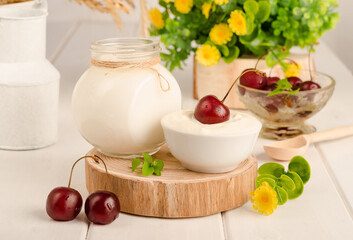 Dairy starter culture for the preparation of fermented milk products, yogurt, kefir on a white wooden background