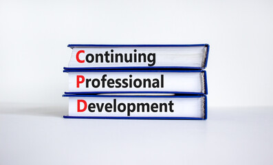 CPD, continuing professional development symbol. Books with words CPD, continuing professional development on beautiful white background. Business, CPD concept.