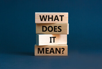 What does it mean symbol. Concept words 'what does it mean' on wooden blocks. Beautiful grey...
