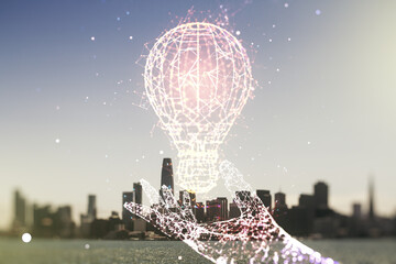 Virtual Idea concept with light bulb illustration on San Francisco skyline background. Multiexposure