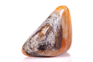 Macro mineral stone jasper on a white background