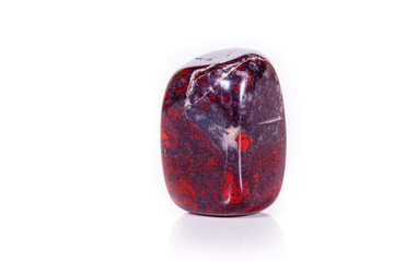 Macro mineral stone jasper hematite on white background